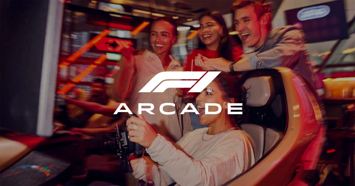 group of people enjoying arcade games